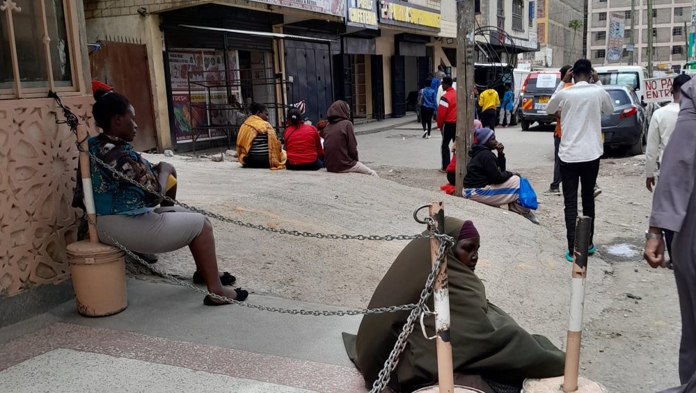 Domestic workers waiting in outside employment sites